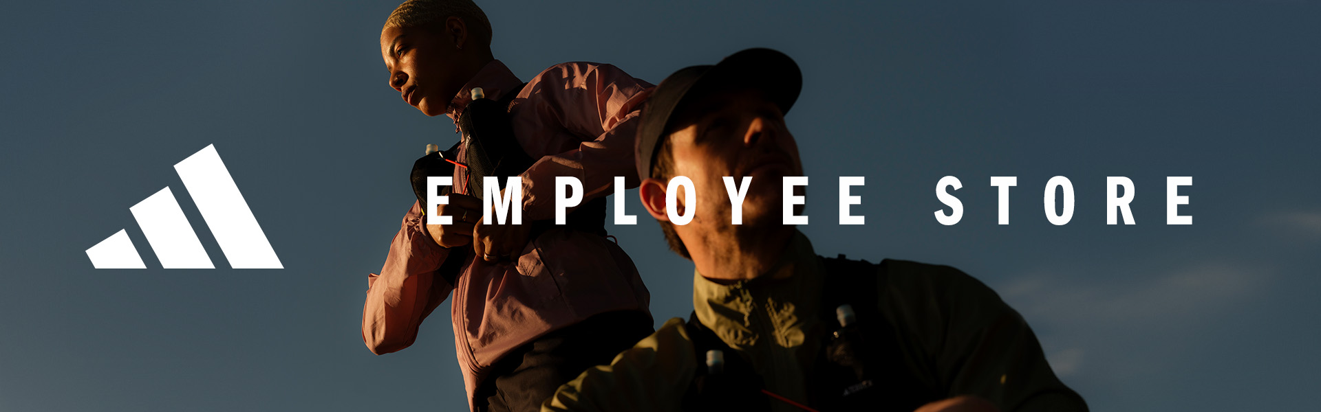 Adidas Employee Store promotional banner featuring two people in outdoor apparel with the adidas logo and the text “Employee Store.”