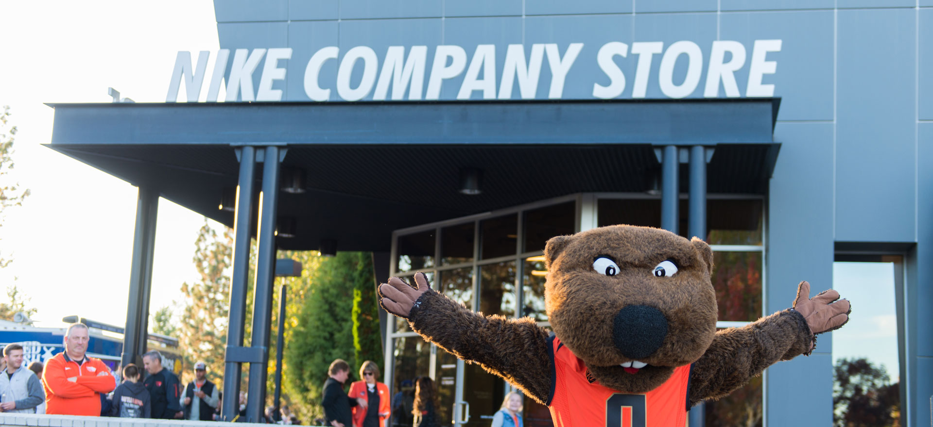 Benny stands with open arms in front of the Nike Company Store