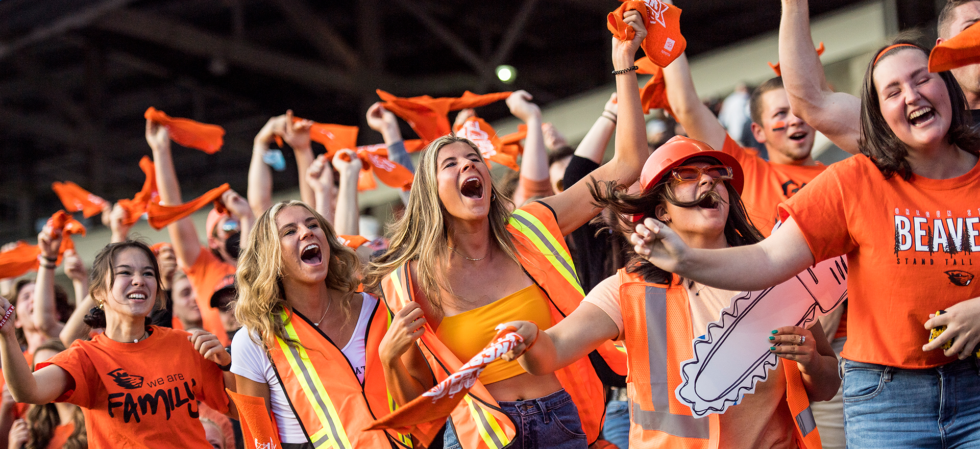 Student fans cheering on the OSU Beavers football team