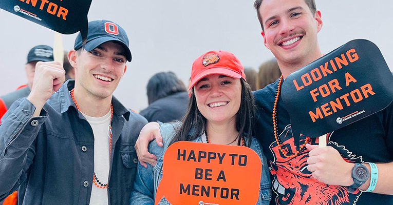 20211219_164443612_iOS (3) (1)-web Alumni holding mentor signs