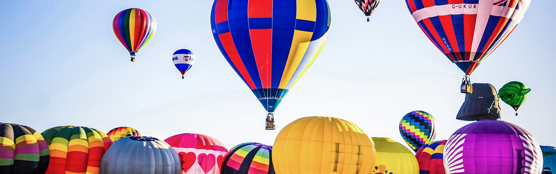 Colorful Hot Air Balloons in a blue sky