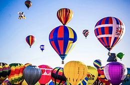 Colorful Hot Air Balloons in a blue sky