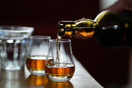 Bourbon being poured into a glass