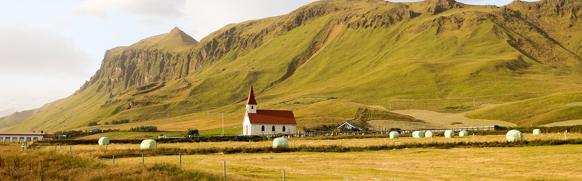Iceland view of hills with a church