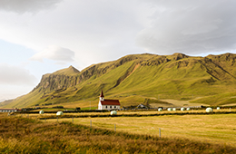 Iceland view of hills with a church
