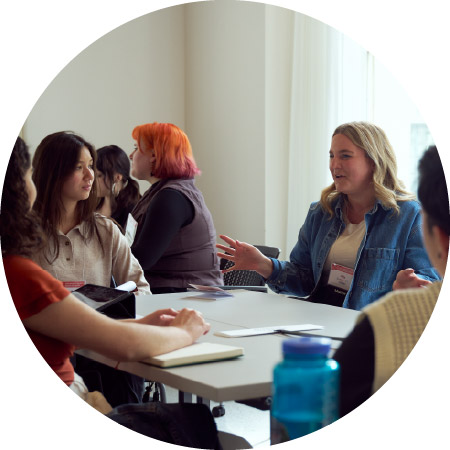 An alumni mentor talking with students.