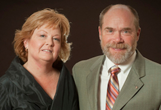 Headshot of Celia Strickland Austin and G. Kenneth Austin III