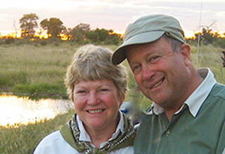 Robert and Sara Rothschild headshot while outside