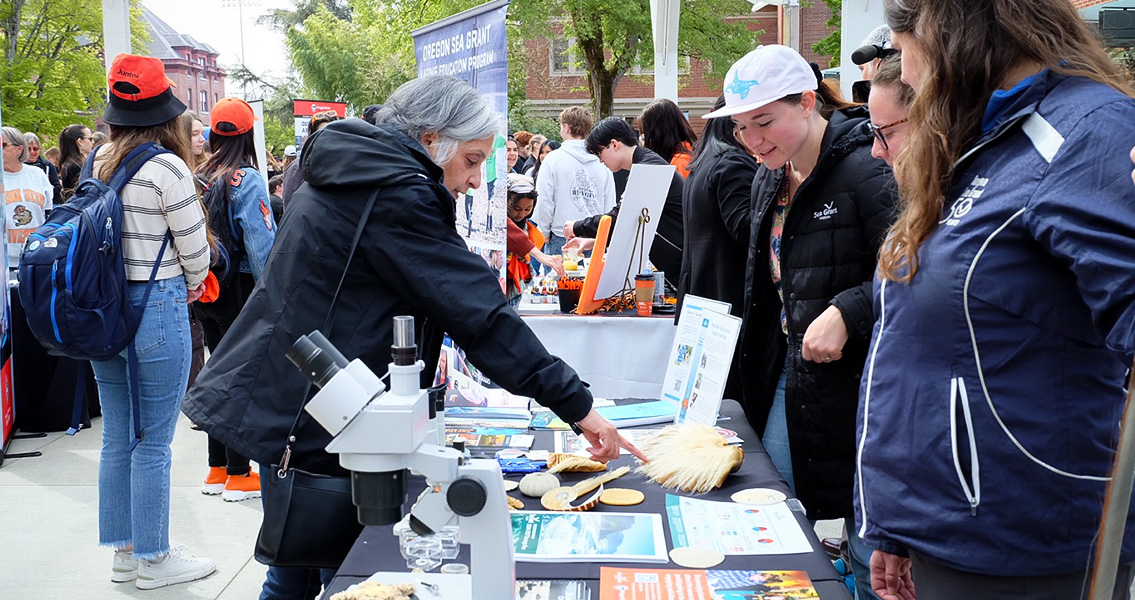 OSU President Jayathi Murthy engaging with students at a science related booth.