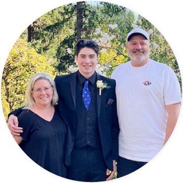 Photo of Jody and Adam Beck with their son.