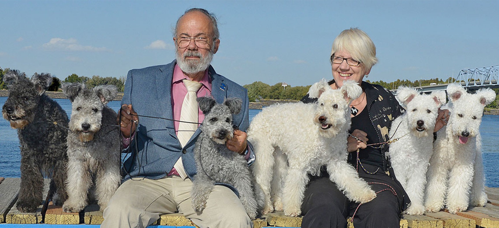 Tom and Chris Levy with pups