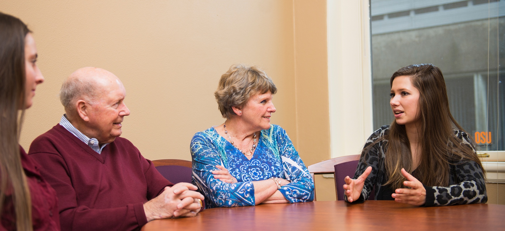 OSUF Donors speaking with others at a table