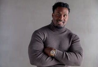 Steven Jackson standing in a sweater