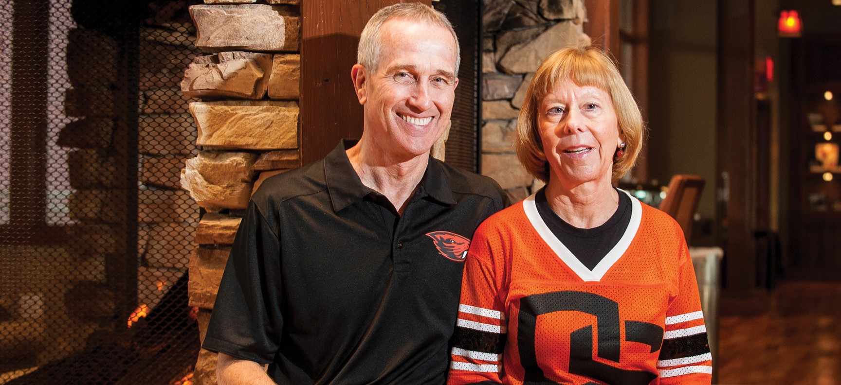 McGrath couple wearing their OSU Beavers fan gear