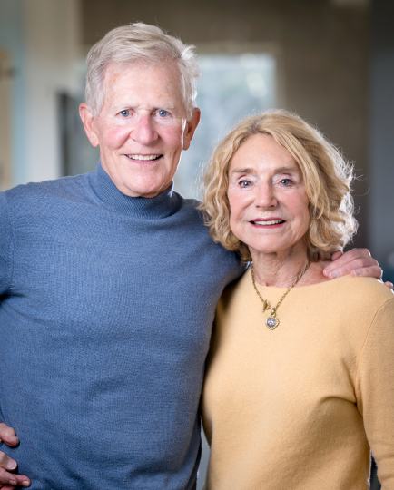 Portrait photo of Mike and Judy Gaulke facing the camera and smiling.