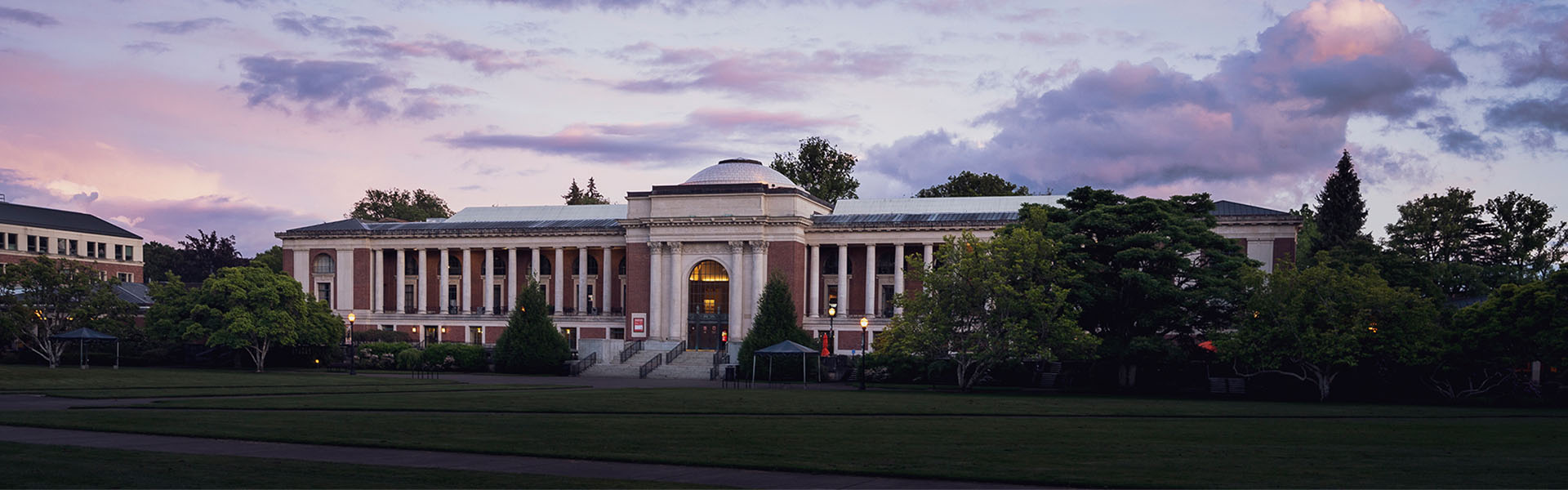 Memorial Union at dusk with a lavender sky.