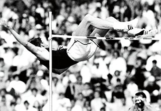 Photo of Dick Fosbury clearing 7 feet, 4 1/4 inches on the high jump to win Olympic gold in Mexico City.