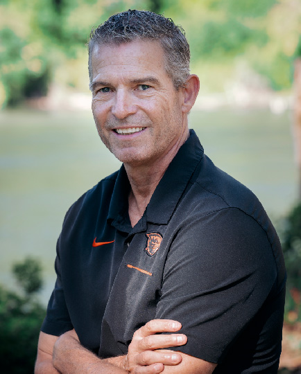 Portrait of David Montagne with a river in the background