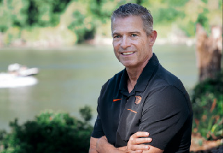 Portrait of David Montagne with a river in the background