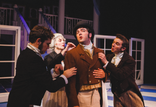 Actors on a stage from the play Sense and Sensibility.