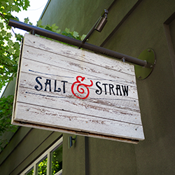 A photo of a Salt & Straw sign