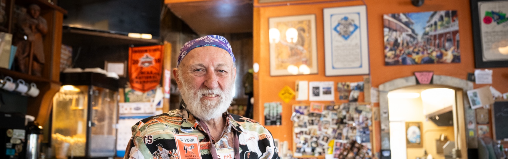 Portrait of Greg Little inside Squirrel's Bar.