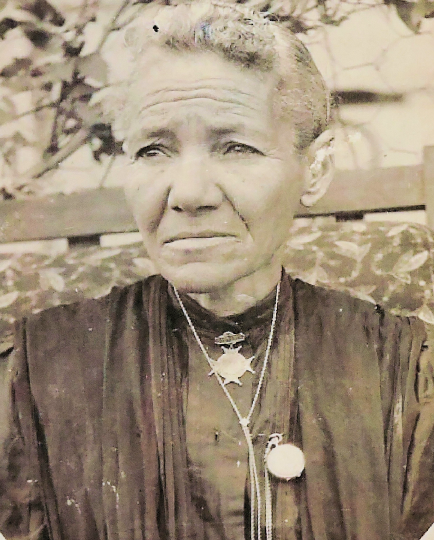 Vintage sepia tone photo in an oval frame of Letitia Carson